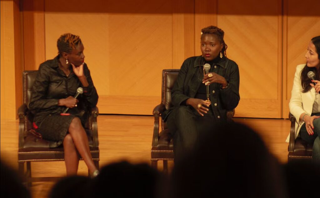 Alice Diop seated next to Rokhaya Diallo during the Q&A. 